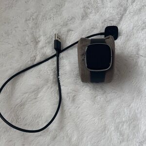 Fitbit Sense with charger